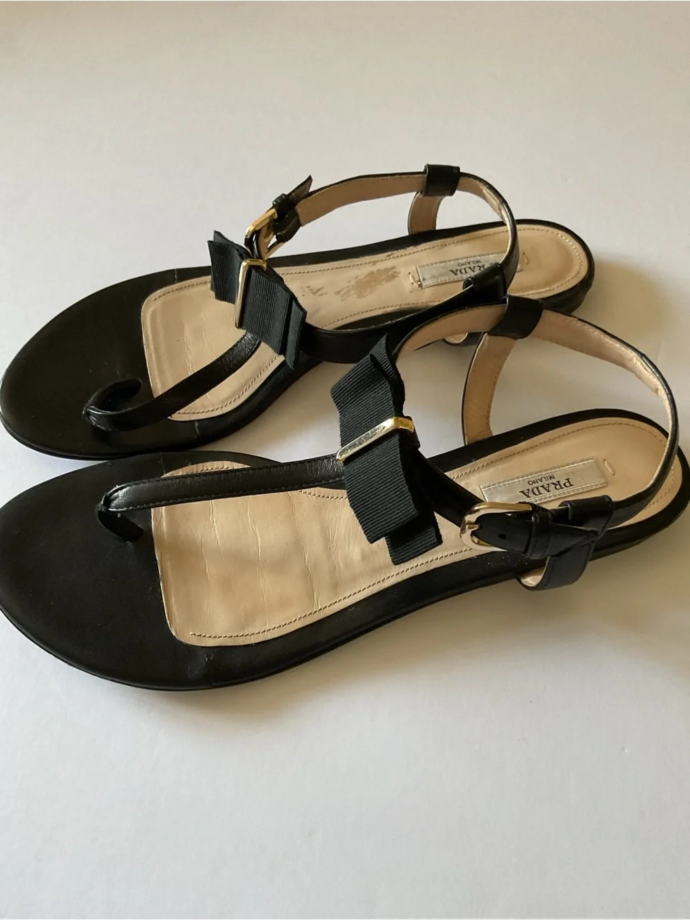PRADA BLACK LEATHER T-STRAP SANDALS WITH BOW DETAIL GOLD HARDWARE 39.5 / 8.5